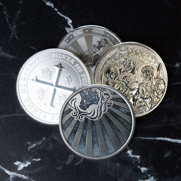 Random Secondary Scottsdale Mint 1 Troy Oz Silver Round (circulated)